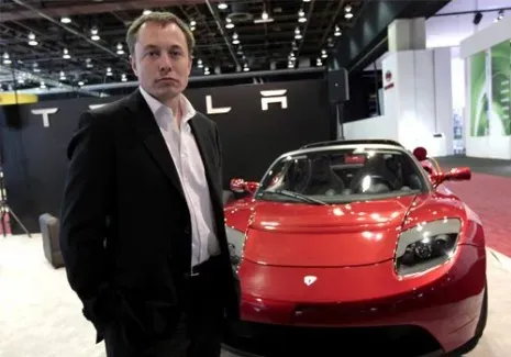 Elon Musk with Tesla Roadster in 2008